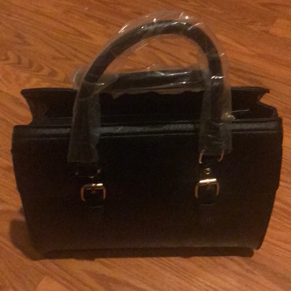 Man made black hand bag.